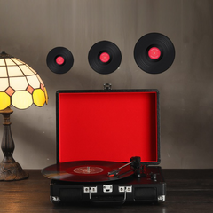 Immerse Yourself in the Timeless Melodies with our Versatile Record Player