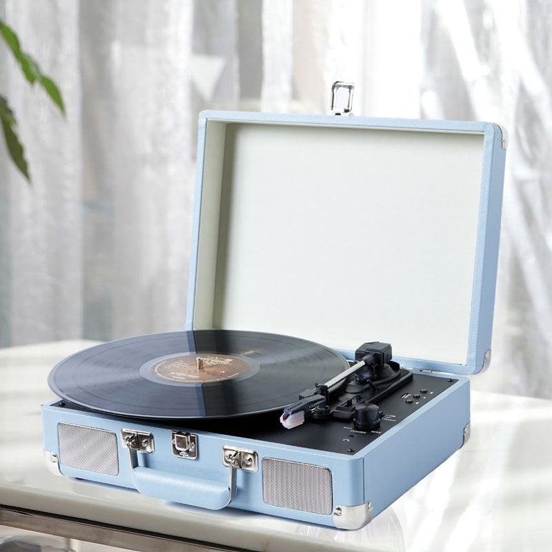 Immerse Yourself in the Timeless Melodies with our Versatile Record Player