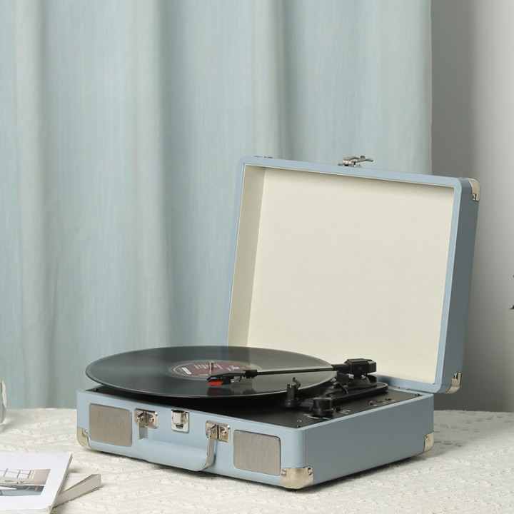 Immerse Yourself in the Timeless Melodies with our Versatile Record Player